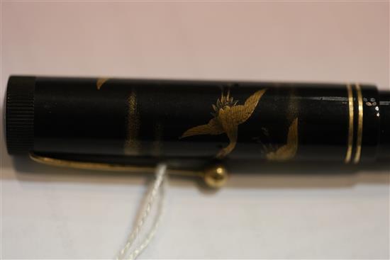 A Dunhill Namiki black lacquered fountain pen, 5.25in.